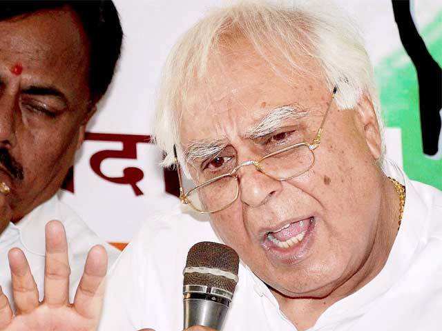 Kapil Sibal addresses a press conference in Patna