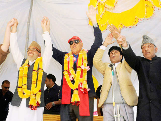 NC President Farooq Abdullah with senior party leaders during an election campaign rally at Pattan