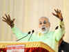 Narendra Modi storms Amethi; attacks Sonia and Rahul Gandhi