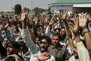 Students of Kashmir University raise their arms while shouting pro-freedom slogans during a protest in Srinagar. (Reuters) Students of Kashmir University raise their arms while shouting pro-freedom slogans during a protest in Srinagar. (Reuters)