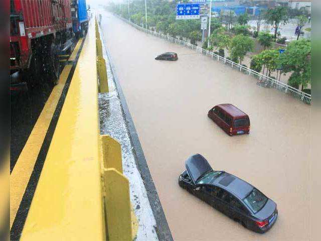 Cars trapped on a flooded street