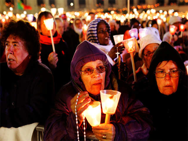 Worshippers gather in Portugal for a vigil