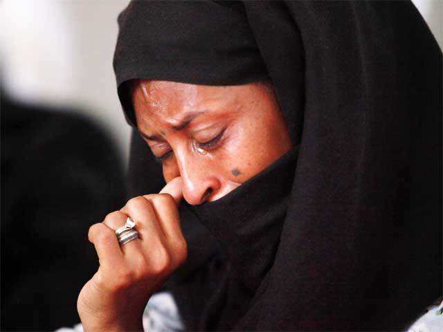 A woman crying in Zawia, west of Tripoli