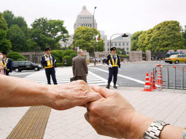 Protest march over Japanese government's plan to expanded military role for the military