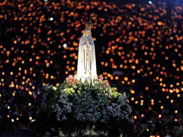 Our Lady of Fatima's statue during a candle light vigil at the Fatima Sanctuary in Portugal