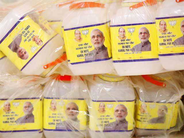 Plastic jars with Modi and Rajnath's picture on it