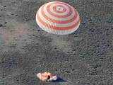 Three astronauts land back on Earth in Soyuz capsule