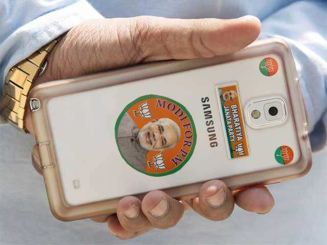 Smartphone with stickers bearing the image of Modi