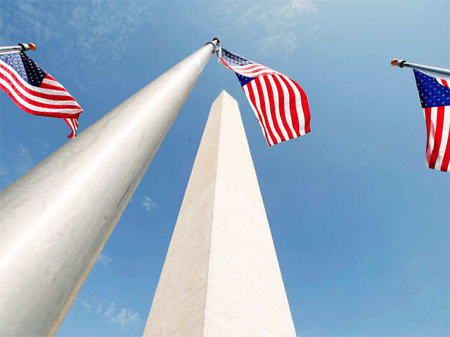 Flags flutter during re-opening ceremony for Washington Monument in Washington