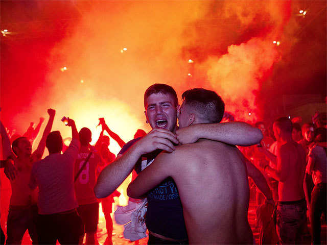 Sevilla's supporters celebrate the victory of their team after the UEFA Europa League final football match