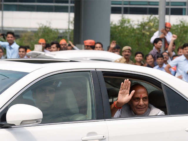 Rajnath Singh waves to supporters