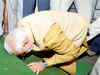Narendra Modi bows as he enters Parliament for first time
