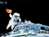 Chinese astronaut waves flag