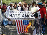 Pakistani Muslims torch a US flag in Hyderabad