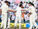 Tendulkar is congratulated by Australian cricketers