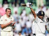 Sachin Tendulkar is applauded by Peter Siddle