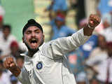 Harbhajan exults after claiming the wicket of Katich