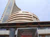 Sensex hits record all-time high; Nifty races past 7,600