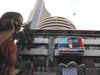 Sensex slips in red after hitting fresh record high