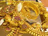 Gold trades steady; outlook by experts