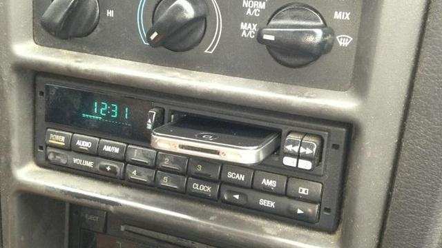 What the Strange Slot in Your Old Car's Dashboard Is Really For