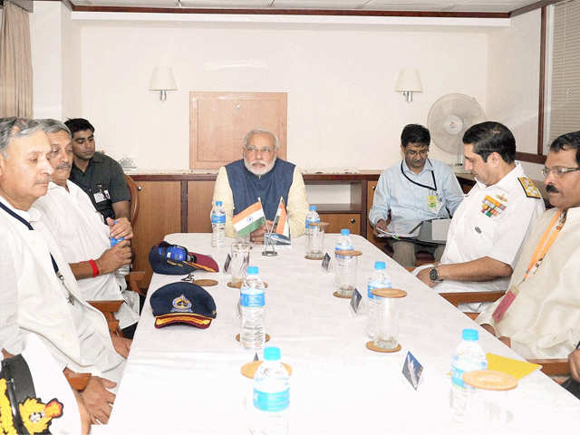 Modi at a meeting with Navy officers onboard INS Vikramaditya