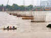Back from Gujarat, Delhi officials all for confining river