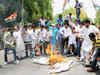 Congress protests against power, water crisis and rail fare hike; burn effigies of Narendra Modi and Arvind Kejriwal