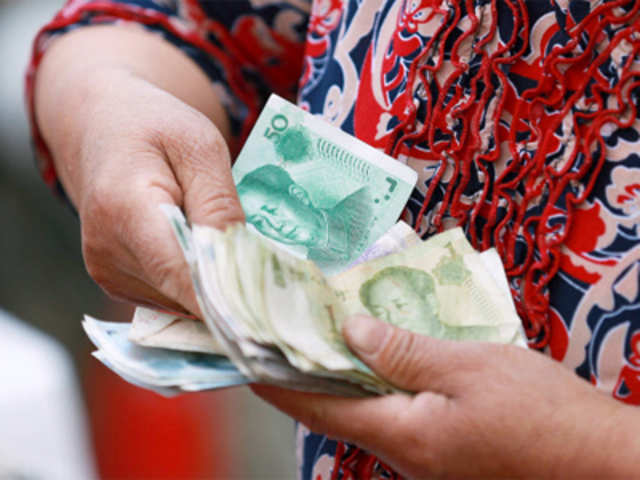 China's yuan slips, recovery expected in H2
