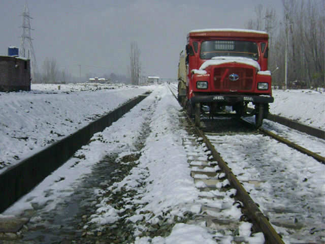 Trucks retrofitted with railway wheels