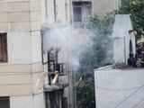 Smoke billows out of Nariman House