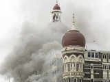 Smoke blows out from Taj
