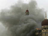 Taj Mahal hotel seen engulfed in smoke