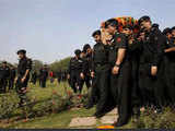 NSG commandos carry the coffin of Gajendra Singh