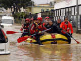 Fire Dept rescuers ferry stranded people