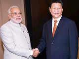 PM Narendra Modi meets Chinese President Xi Jinping; presses for solution to boundary issue