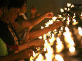 Church-goers light candles