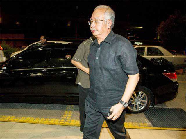 Malaysian PM Najib Razak arrives at Kuala Lumpur Airport