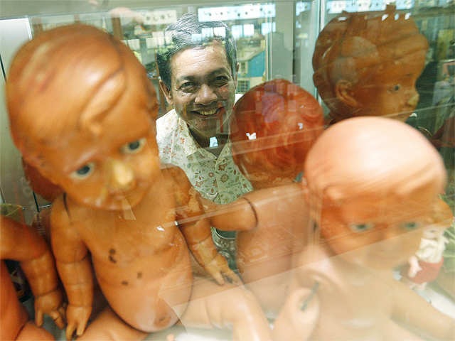 Founder of the Museum with Japanese celluloid dolls