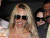 Pamela Anderson shares kiss with estranged husband