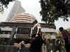 Sensex ends at record high of 26,147; Nifty below 7,800