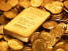 Gold ends flat, crude prices slip