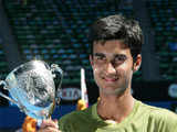 Bhambri poses with the trophy after winning championship