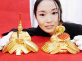 Pure gold 'hina' dolls