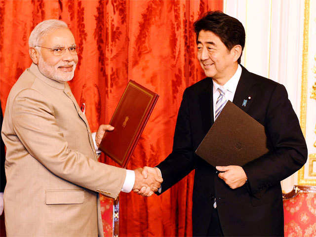 PM Narendra Modi & Shinzo Abe exchange files