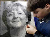 Puzzle portrait of Angela Merkel