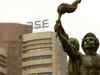 Sensex ends past 27,000-mark for first time