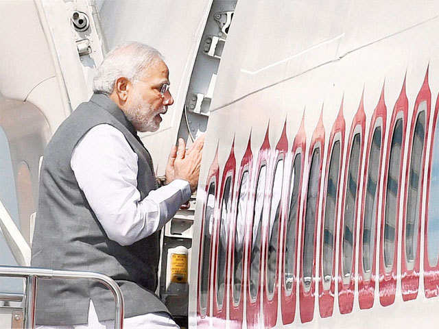 Prime Minister Modi boards his plane in Tokyo
