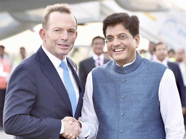 Abbott received at the airport by Piyush Goyal
