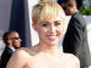 Miley Cyrus goes topless at a party